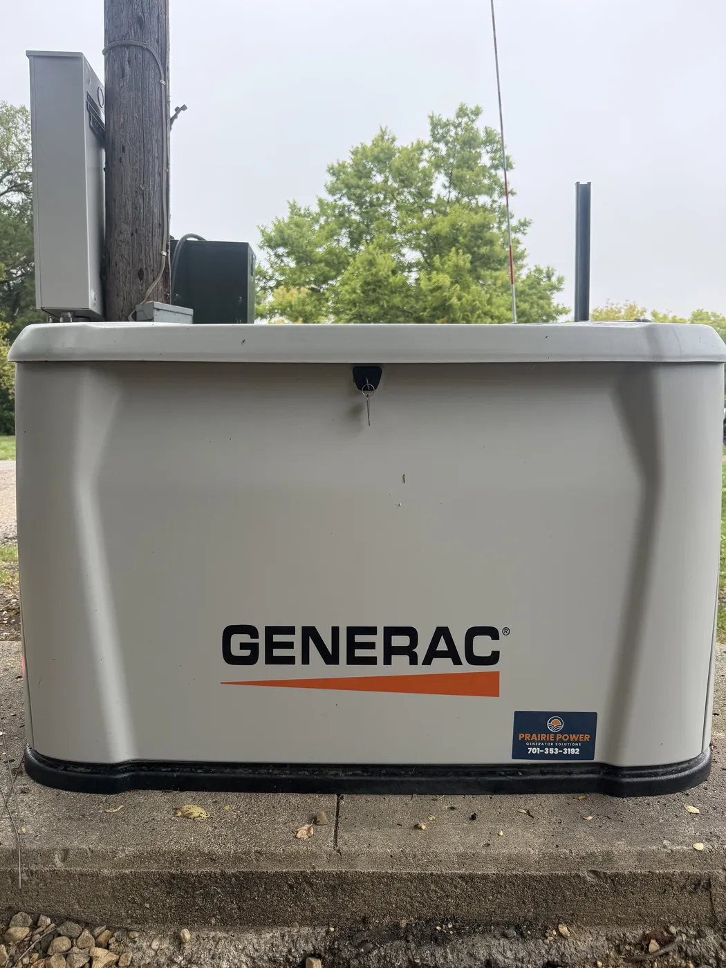 Front view of a commissioned Generac home standby generator in Wahpeton, North Dakota, installed by Prairie Power - Generator Solutions
